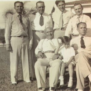 A group of men in suits and ties posing for the camera.