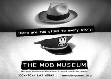 A black and white poster of two hats